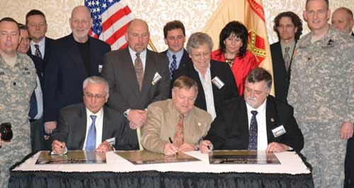 People signing Community Covenant